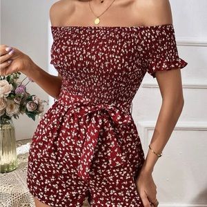 Off the shoulder romper. Never worn. Ties at the waste